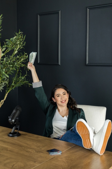 Sara relaxing with her feet up at her desk